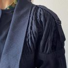 Imagen de Detalles chaqueta mangas volumen
